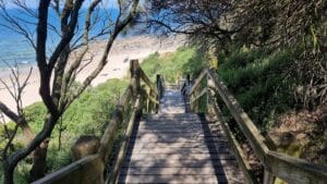 a wooden staircase onto shack bay beach