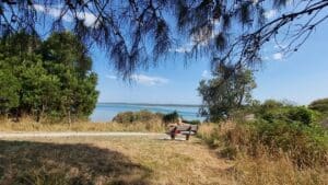 sitting on a park bench overlooking Andersons inlet