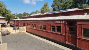 red steam train at Coal Creek historic village in Korumburra