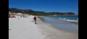 walking along the white sands of Sqeaky Beach Wilsons Prom